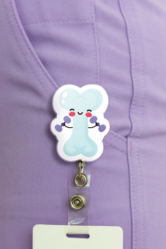Adorable cartoon bone badge reel with badge clip on purple scrubs