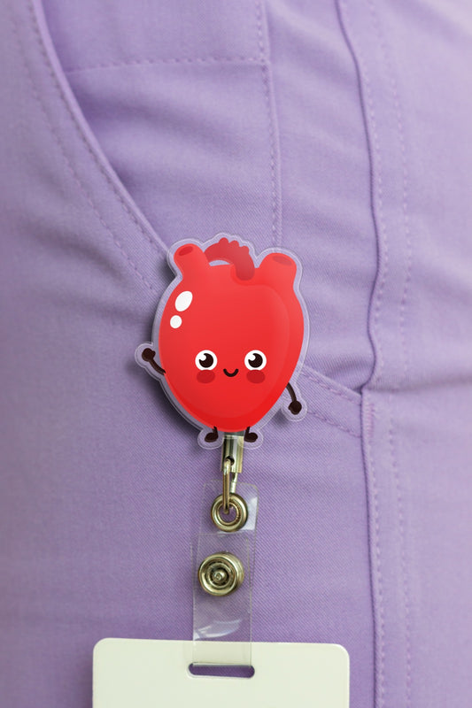 Adorable heart badge reel with badge clip on purple scrubs