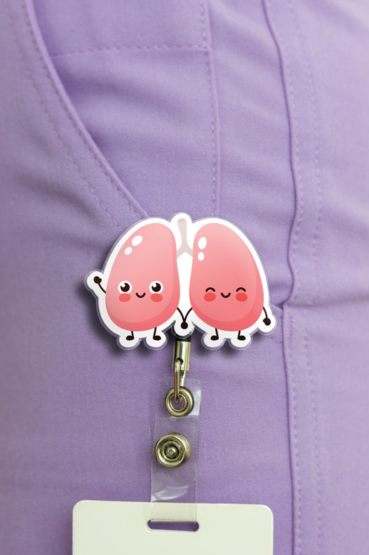 Cute cartoon smiling lungs badge reel on lilac scrubs