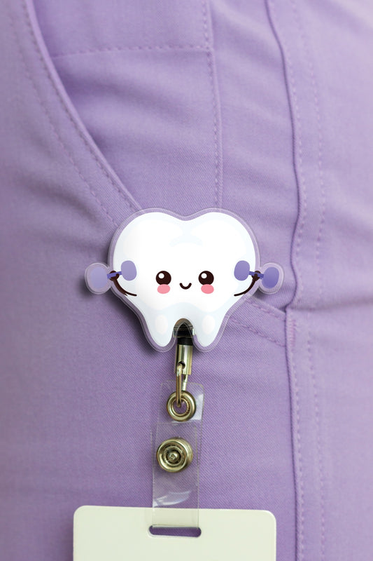Illustrated tooth badge reel with badge clip